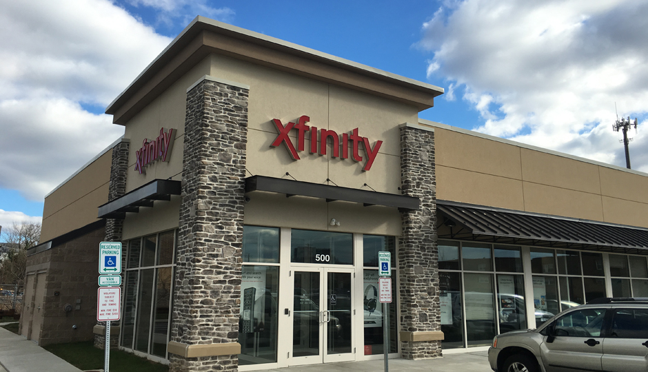 XFINITY Store by Comcast Logo