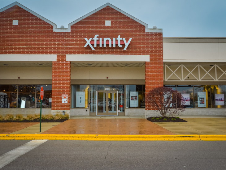 XFINITY Store by Comcast Logo